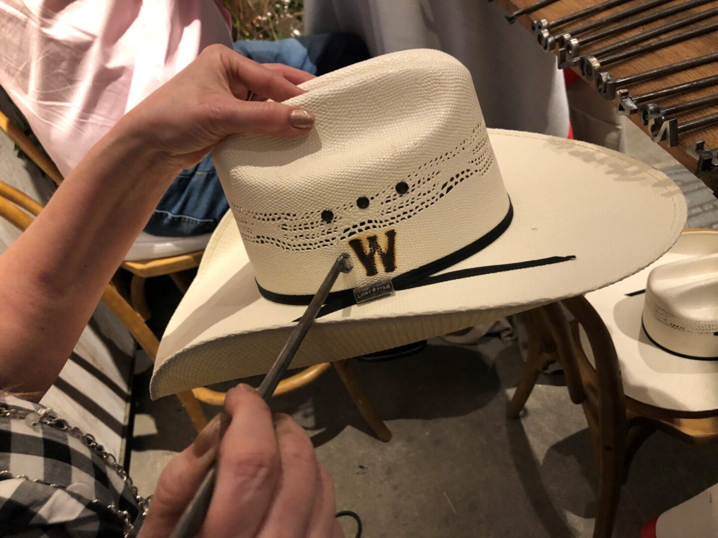 Branding a cowboy hat